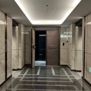 An entrance for hallway featuring polished marble floors in luxury apartment in china